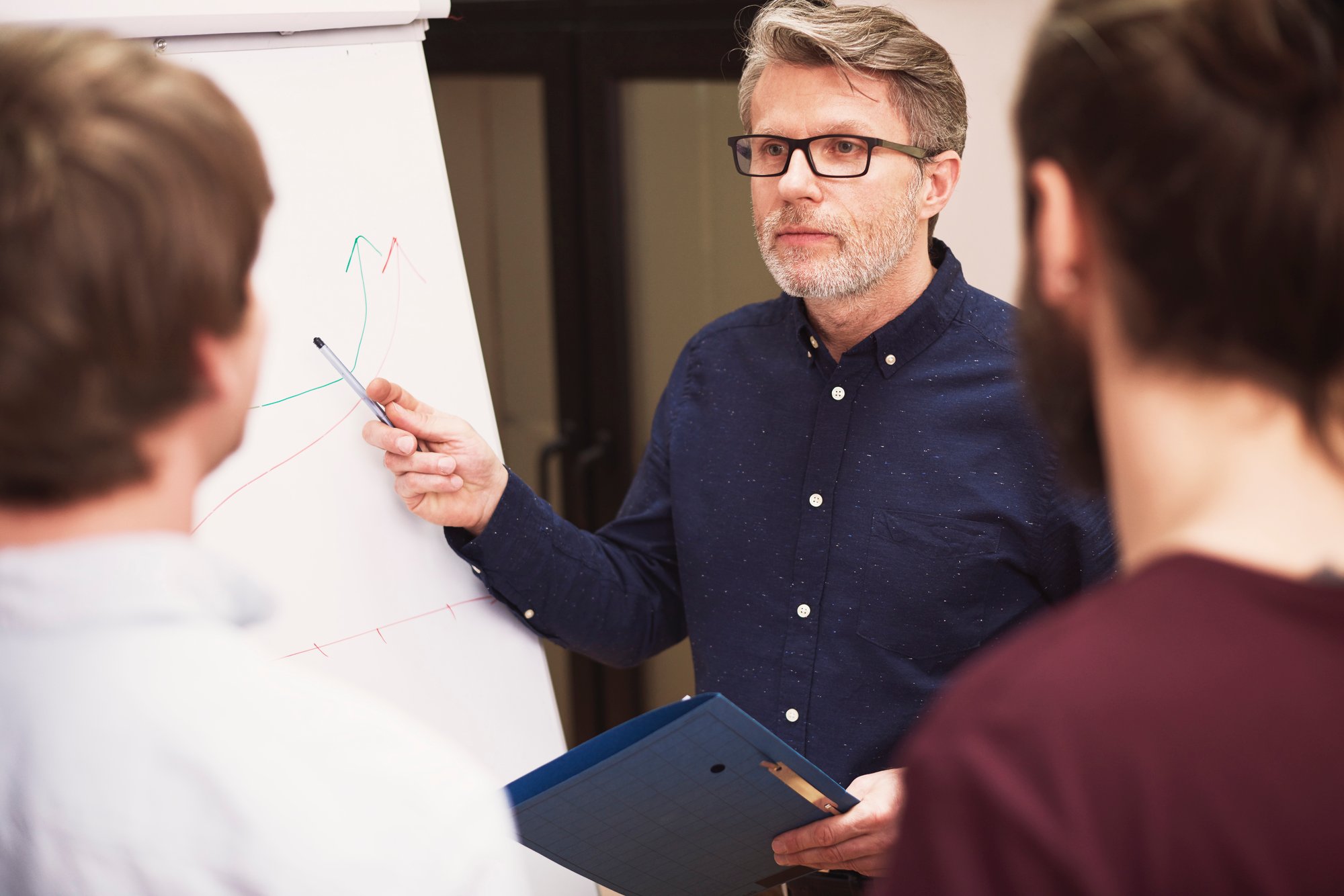 group-creative-people-analyzing-result-work